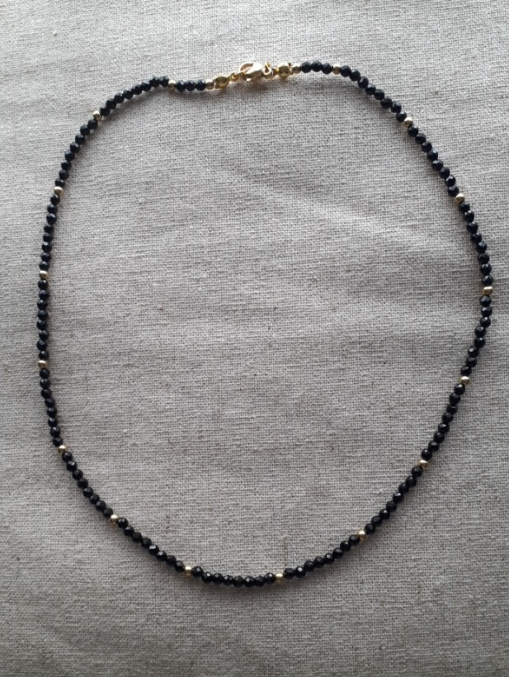 Black Crystal Beaded Necklace with Gold Accents